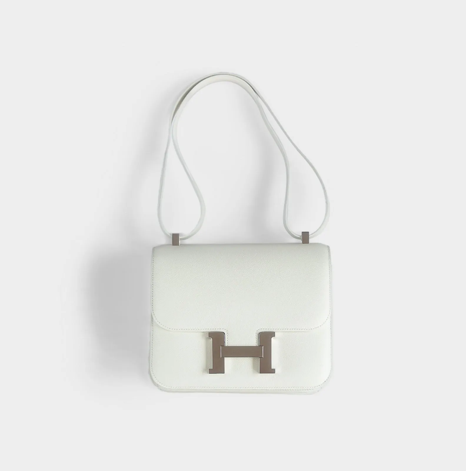 HERMÈS - CONSTANCE 24 SHOULDER BAG WHITE WITH PALLADIUM HARDWARE