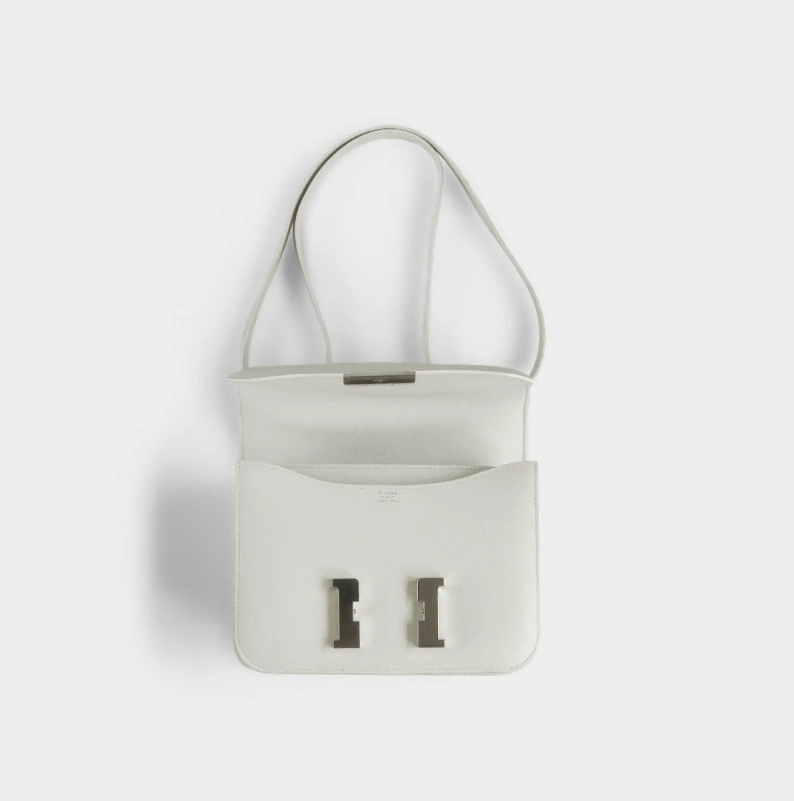 HERMÈS - CONSTANCE 24 SHOULDER BAG WHITE WITH PALLADIUM HARDWARE