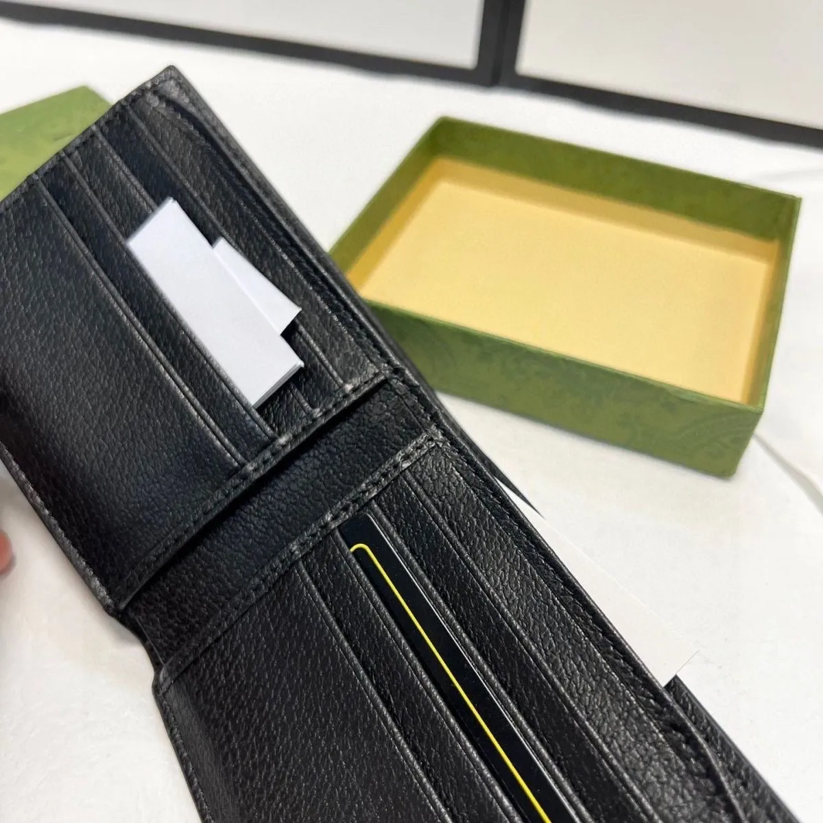 MBG048 GG Marmont leather bi-fold wallet / 4.3"W x 3.5"H